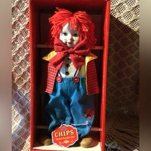 Doll/clown “CHIPS”…musical porcelain clown.  Plays “Send in the Clowns.”